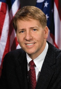 Profile headshot of Richard Cordray