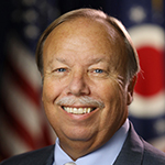 Dwight Holcomb, Executive Director