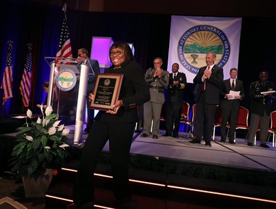 Dr. Yvonne Pointer, an activist and philanthropist from Cleveland, accepts the •	Distinguished Civilian Leadership Award at the 2019 Law Enforcement Conference.