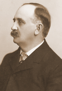 Profile headshot of George K. Nash