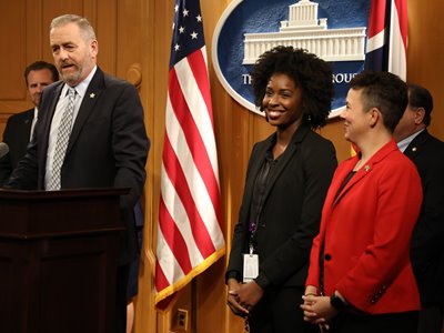 From left, Attorney General Dave Yost introduces the Human Trafficking Initiative's Jomel Aird, director of victim services, and Jennifer Rausch, legal director.