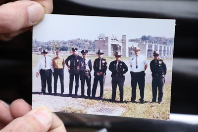 In this photo, likely taken in 1971 at the dedication of the Racine dam and locks, Howard Mullen stands fourth from the left.